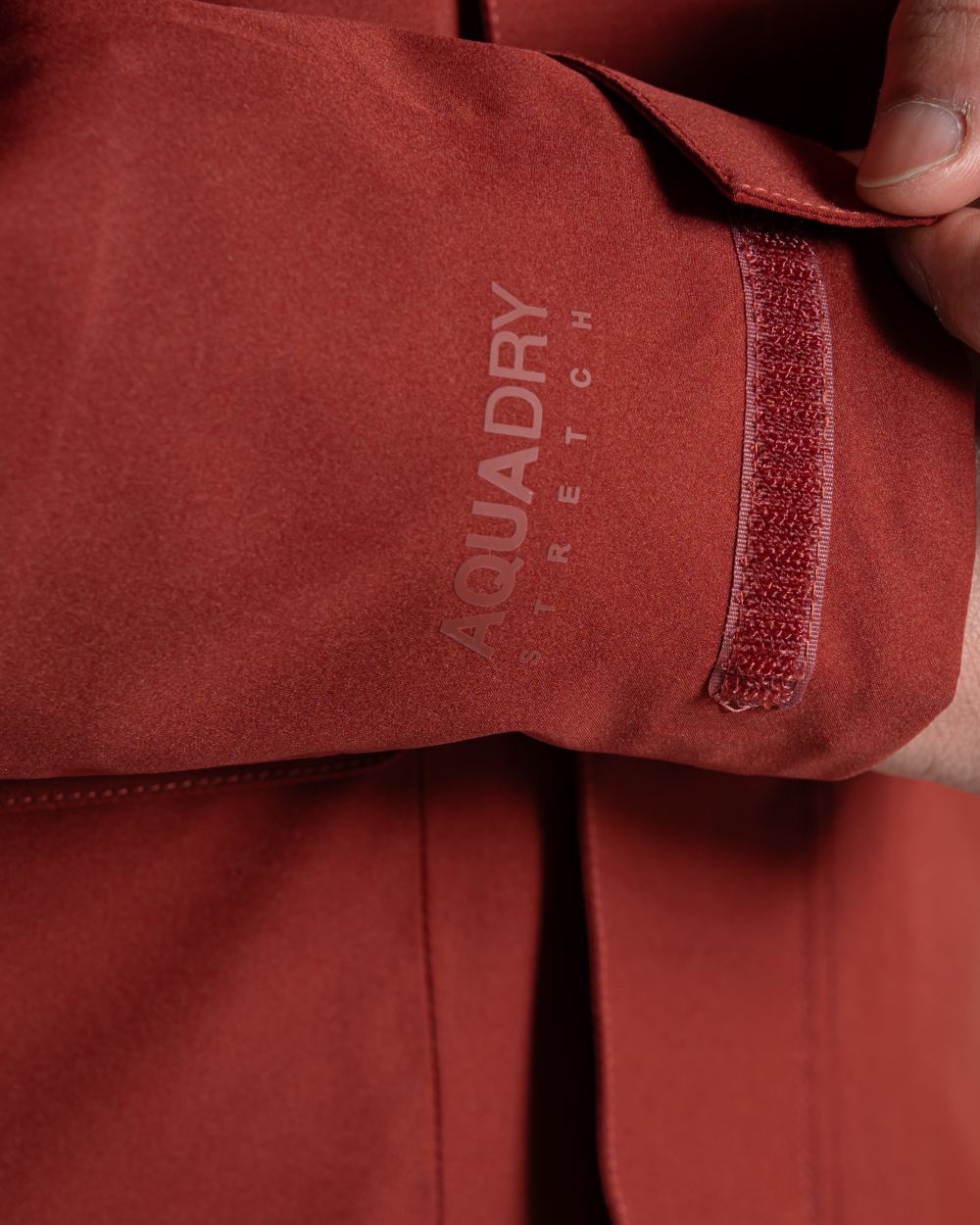 Red Jasper coloured Craghoppers Mens Lorton II Waterproof Jacket on white background