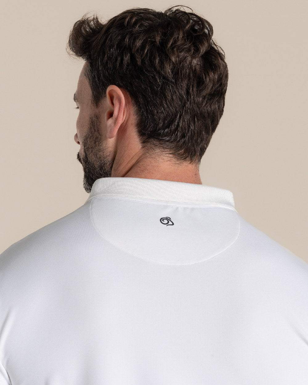 White Coloured Craghoppers mens Nosilife Bramshaw Long Sleeved Polo Top on Beige Background