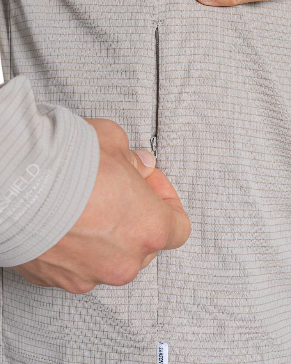 Parchment coloured Craghoppers Mens NosiLife SolarShield+ Half Zip Top on white background