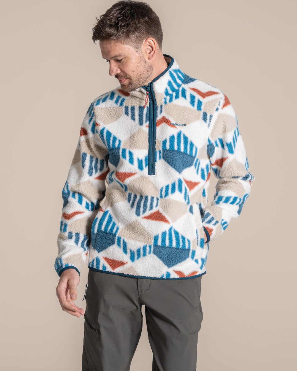 River Blue coloured Craghoppers Mens Tatton II Half Zip on beige background