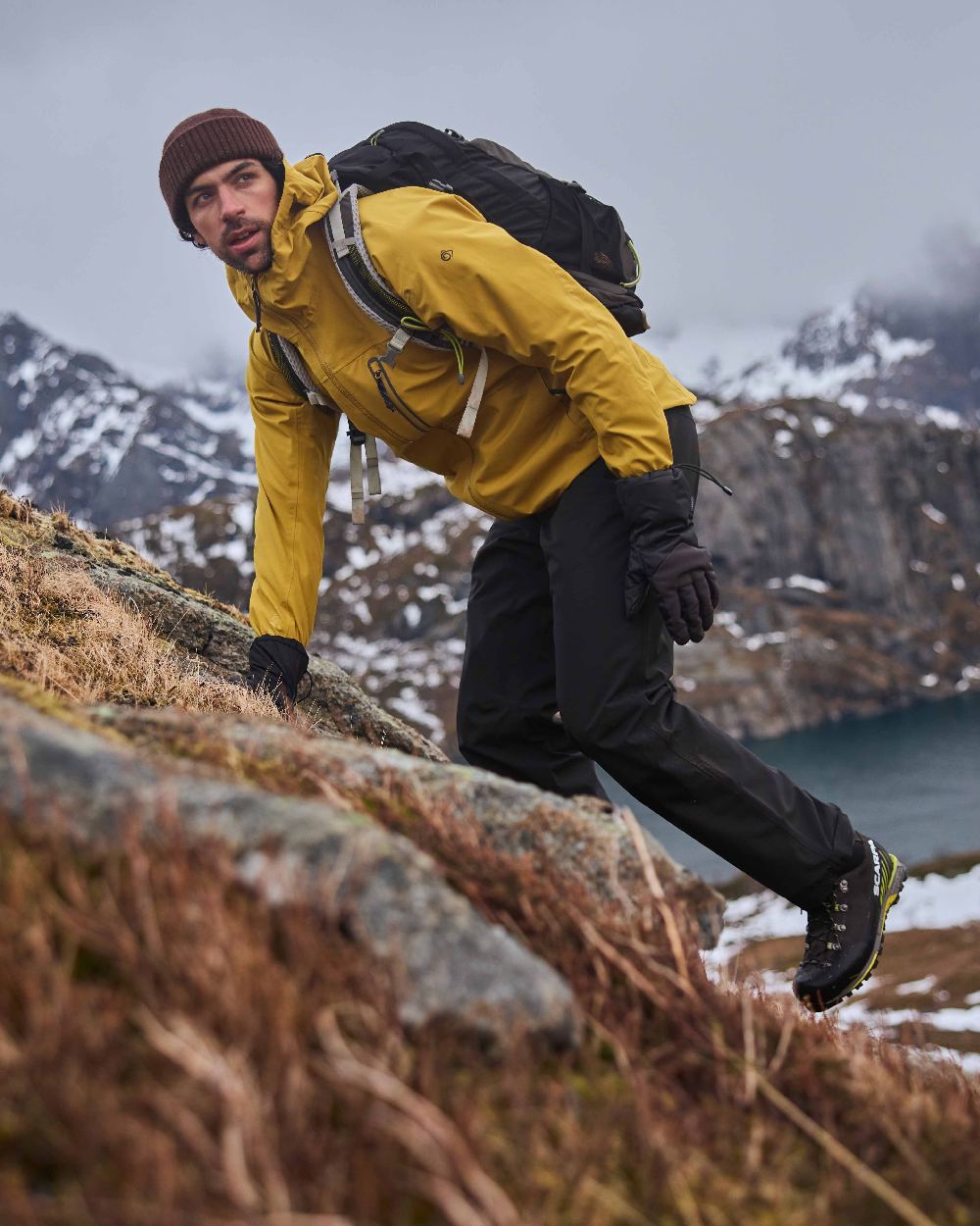 Black colour Craghoppers Steall Pro Thermo Waterproof Trouser on forest background