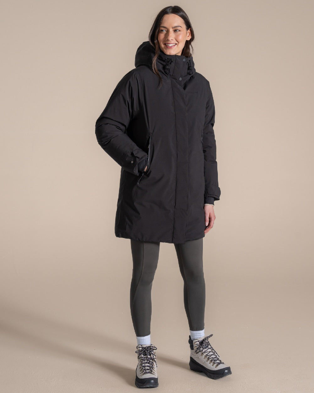Black coloured Craghoppers Women Helena Jacket on beige background