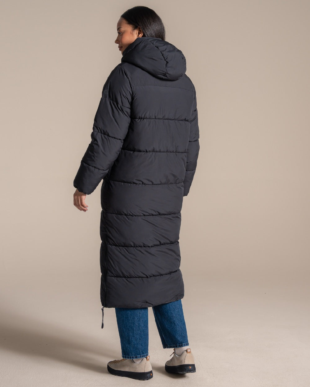 Black coloured Craghoppers Womens Narlia II Hooded Jacket on beige background