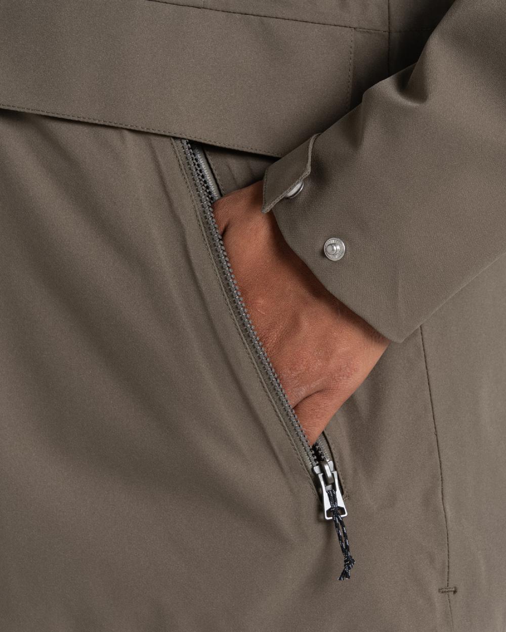Wild Olive coloured Craghoppers Womens Caldbeck II Waterproof Jacket on white background