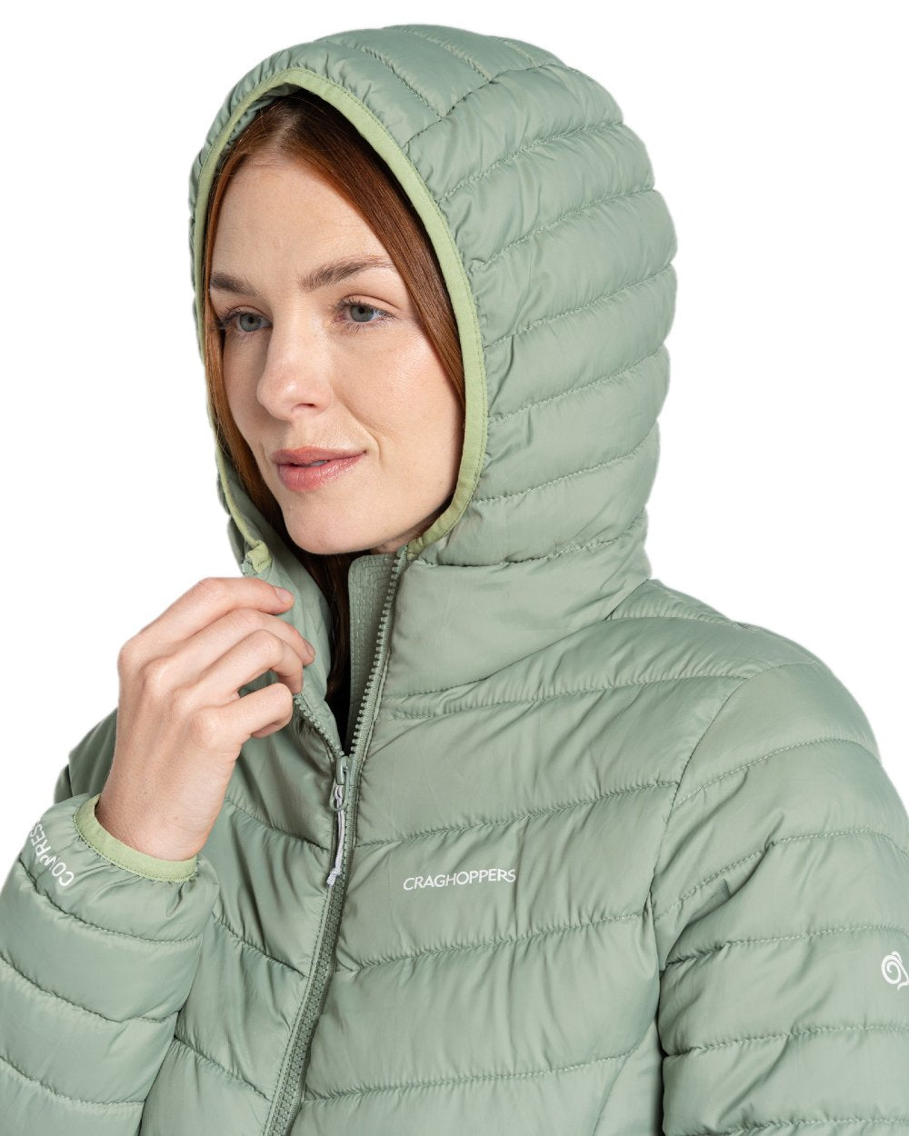 Deep Bud Green coloured Craghoppers Womens Compresslite IX Hooded Insulating Jacket on white background