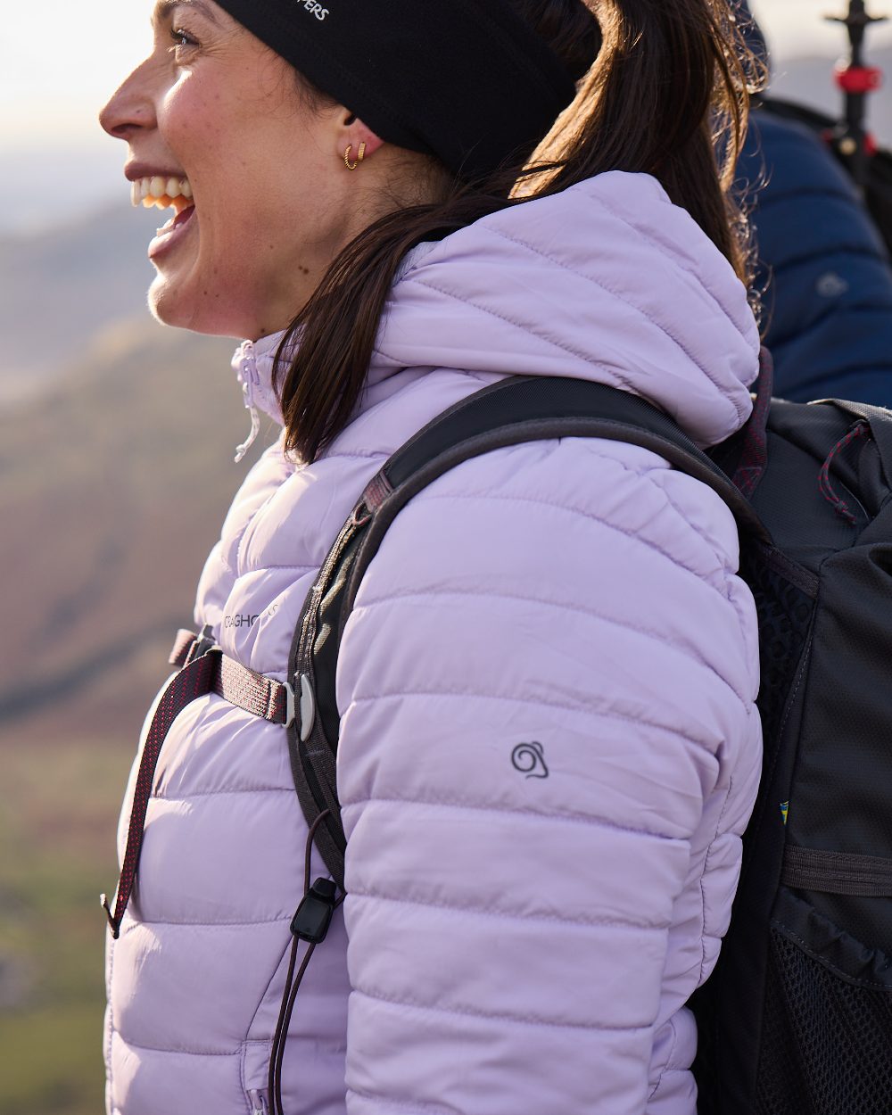 Parma Violet Coloured Craghoppers Womens Compresslite IX Hooded Insulating Jacket on mountain background