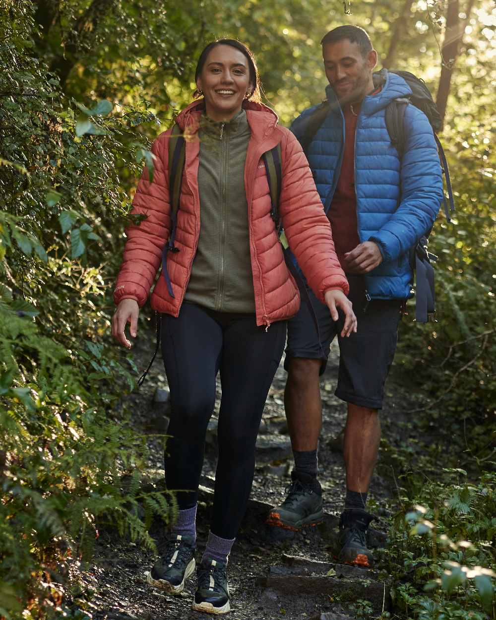 Red Sandstone coloured Craghoppers Womens Compresslite IX Hooded Insulating Jacket on forest background