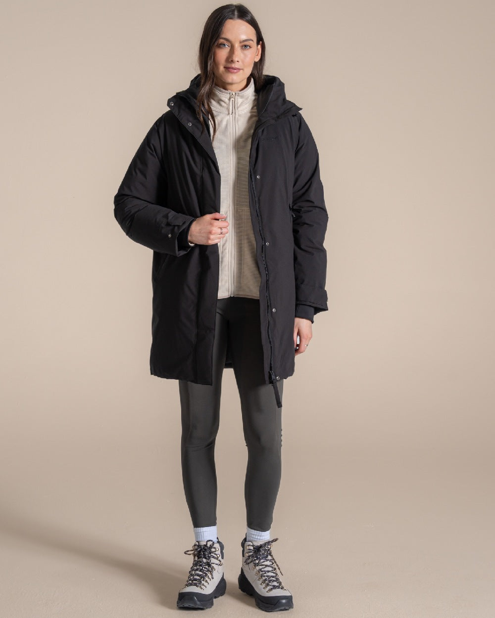 Black coloured Craghoppers Women Helena Jacket on beige background