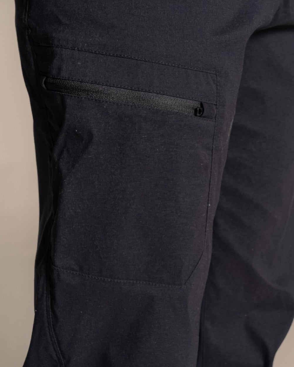 Black Coloured Womens KiwiPro Barrel Trouser on Beige Background