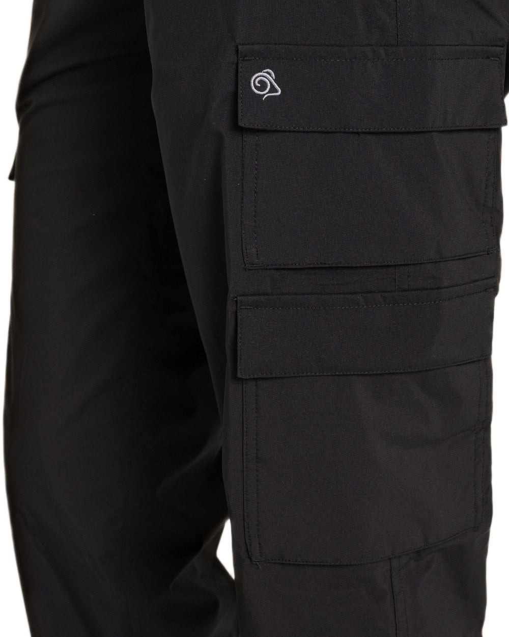 Black coloured Craghoppers Womens Natales Waterproof Lightweight Cargo Trousers on white background