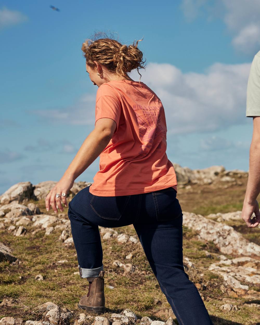 Red Sandstone coloured Craghoppers Womens National Trust Bistort Short Sleeved T-Shirt on sky background
