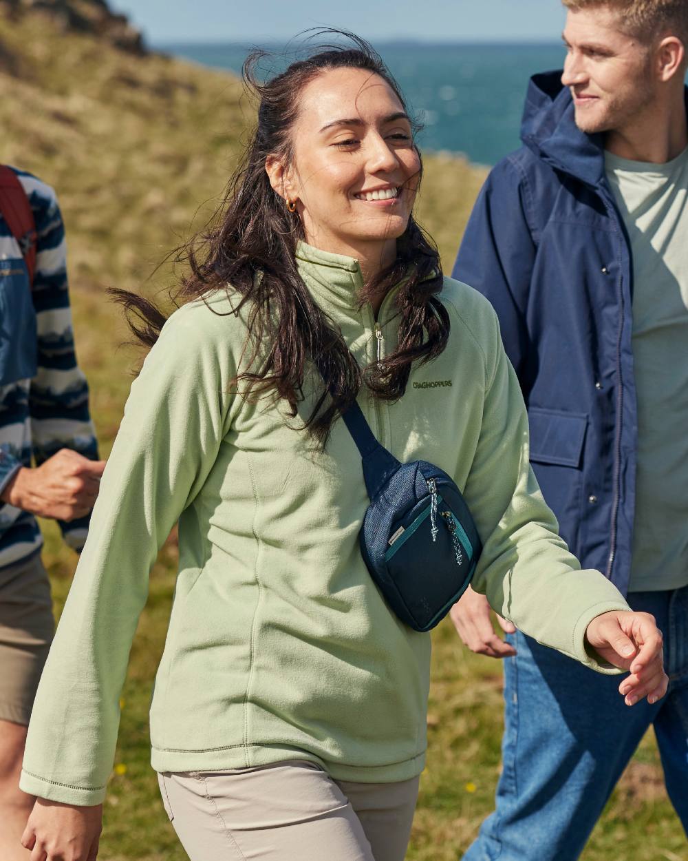 Sage coloured Craghoppers Womens National Trust Miska Half Zip Top on mountain background