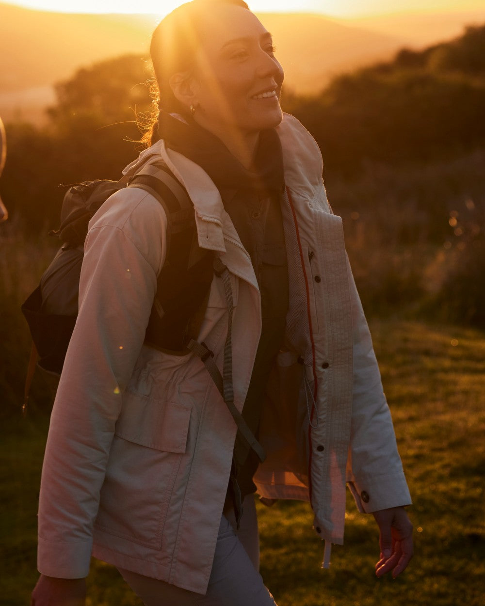 Stone coloured Craghoppers Womens NosiLife Adventure Jacket II on forest background