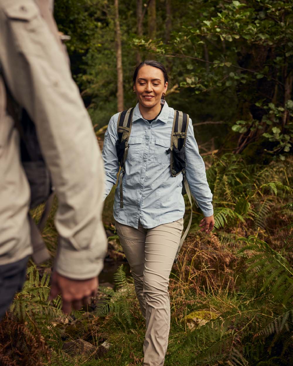 Nimbus Blue coloured Craghoppers Womens NosiLife Adventure Long Sleeved Shirt III on forest background
