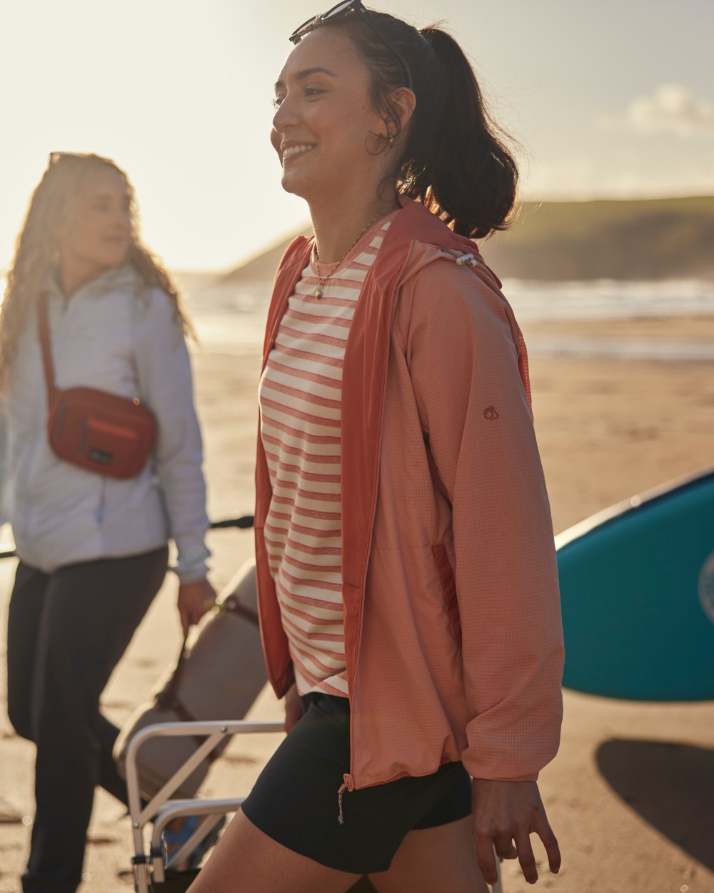 Clay Stripe coloured Craghoppers Womens NosiLife Akona Long Sleeved Top on beach background