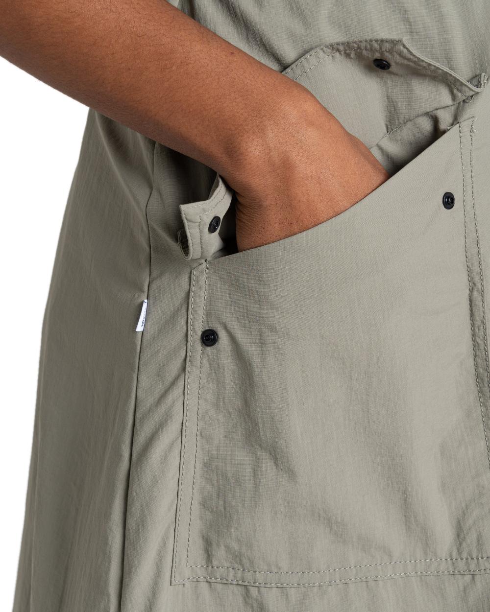 Vert coloured Craghoppers Womens NosiLife Carina Adventure Dress on white background