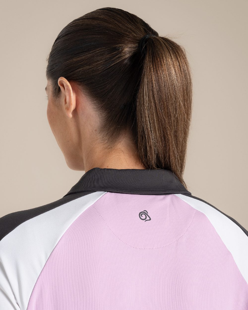 Orchid White Craghoppers omens Nosilife Hazelmere Short Sleeved Polo Top on Beige Background
