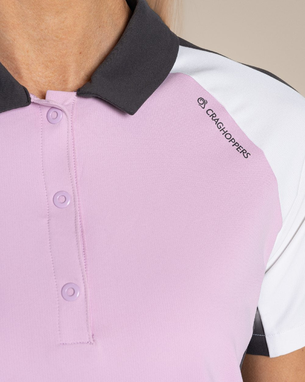 Orchid White Craghoppers omens Nosilife Hazelmere Short Sleeved Polo Top on Beige Background