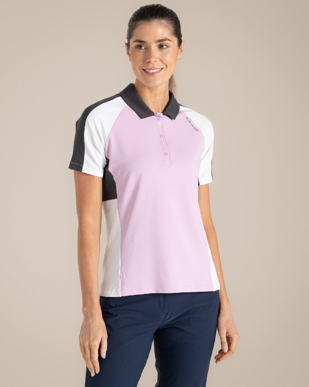 Orchid White Craghoppers omens Nosilife Hazelmere Short Sleeved Polo Top on Beige Background