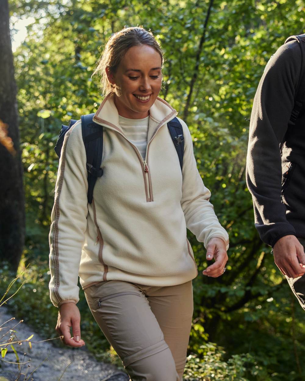 Soft Mushroom coloured Craghoppers Womens NosiLife Pro Convertible Trousers on forest background