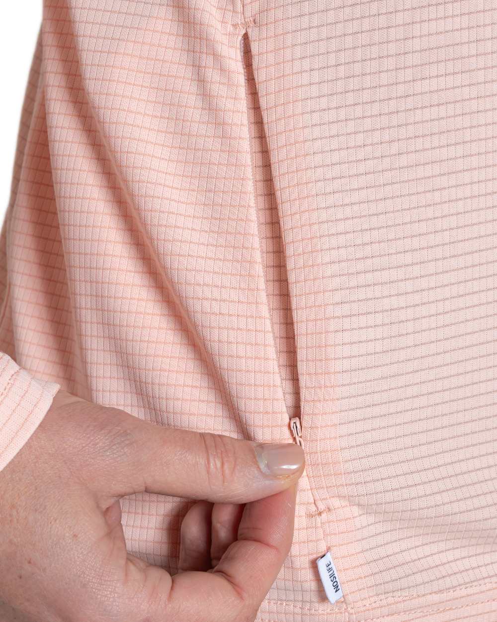 Sherbert coloured Craghoppers Womens NosiLife SolarShield+ Half Zip Top on white background