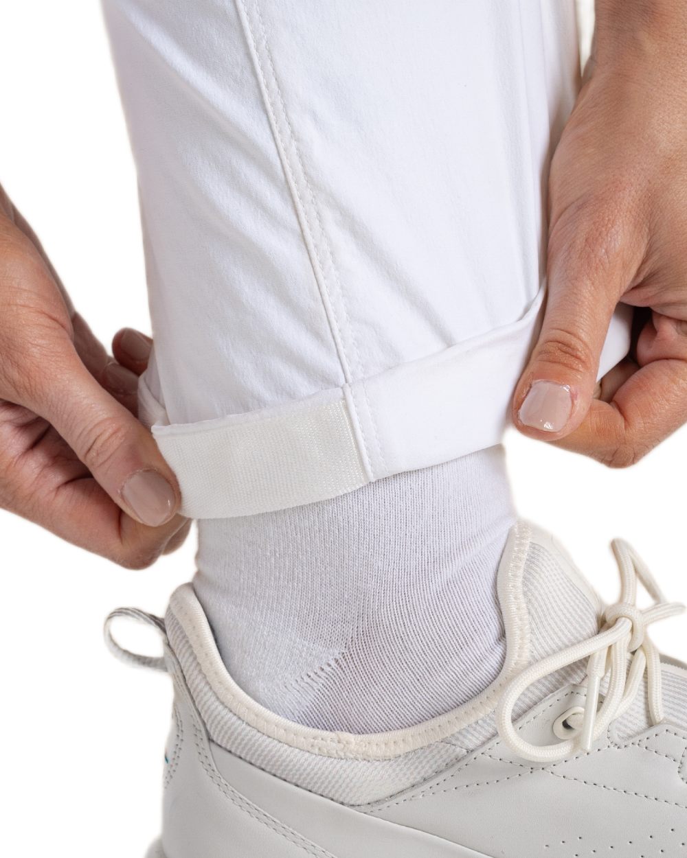 White coloured Craghoppers Womens Nosilife Milla Golf Trousers on white background