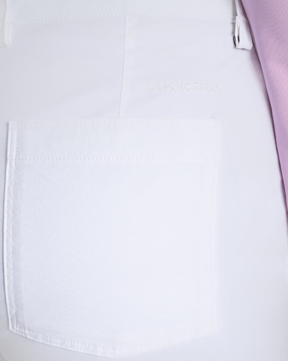 White coloured Craghoppers Womens Nosilife Milla Golf Trousers on white background