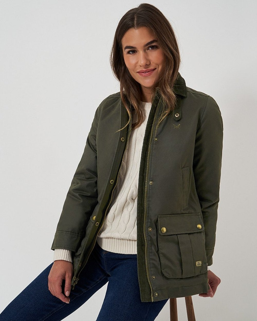 Green Coloured Crew Clothing Womens Wax Jacket on indoor background