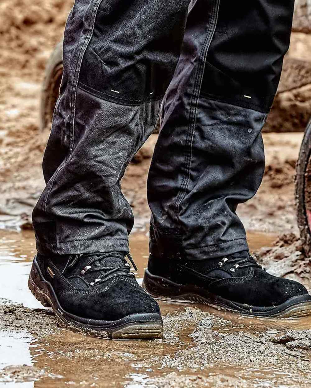 Black Coloured DeWalt Challenger Waterproof Safety Hiker Boots on outdoor background