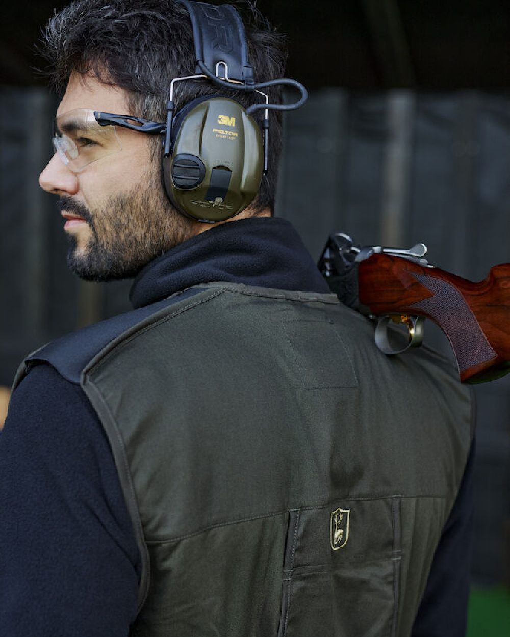Timber coloured Deerhunter Atlas Shooting Waistcoat on blurry background