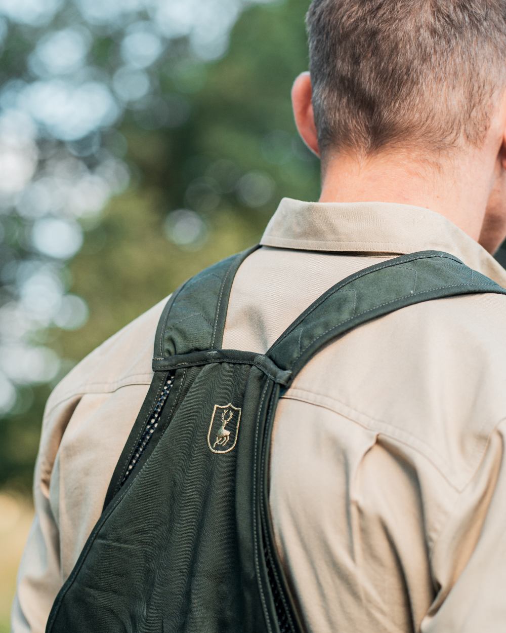 Timber coloured Deerhunter Atlas Waistcoat on forest background