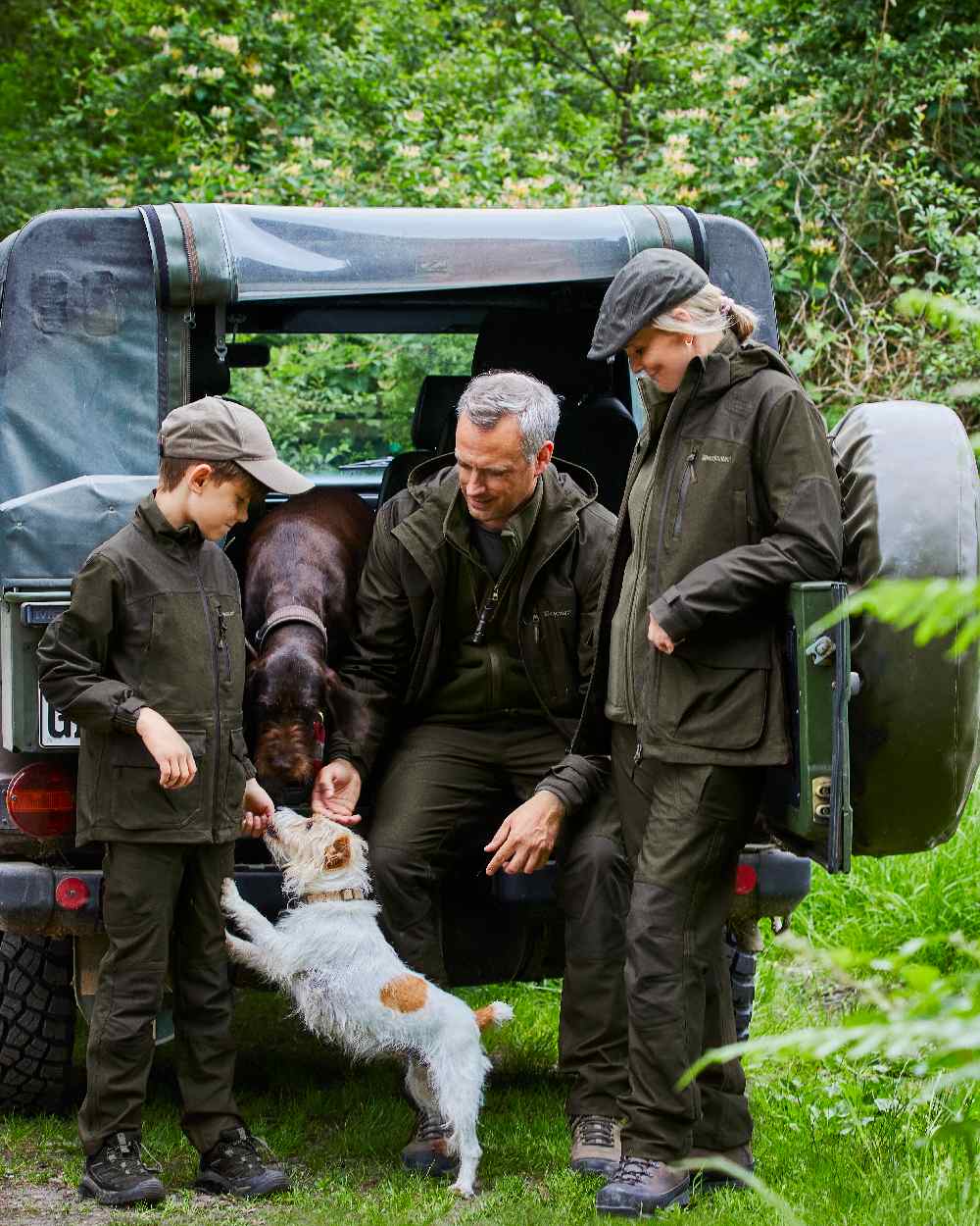 Olive Night Melange coloured Deerhunter Chasse Trousers on tree background