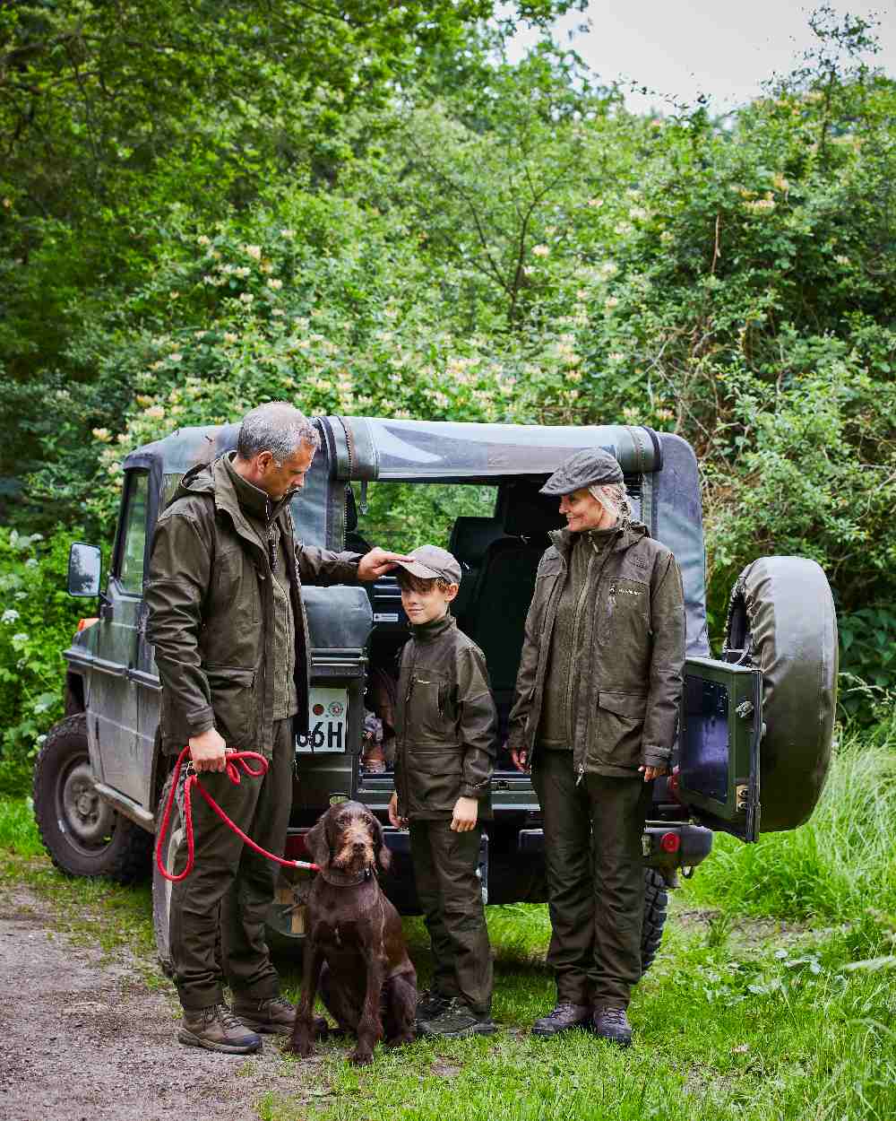 Olive Night Melange coloured Deerhunter Chasse Trousers on tree background