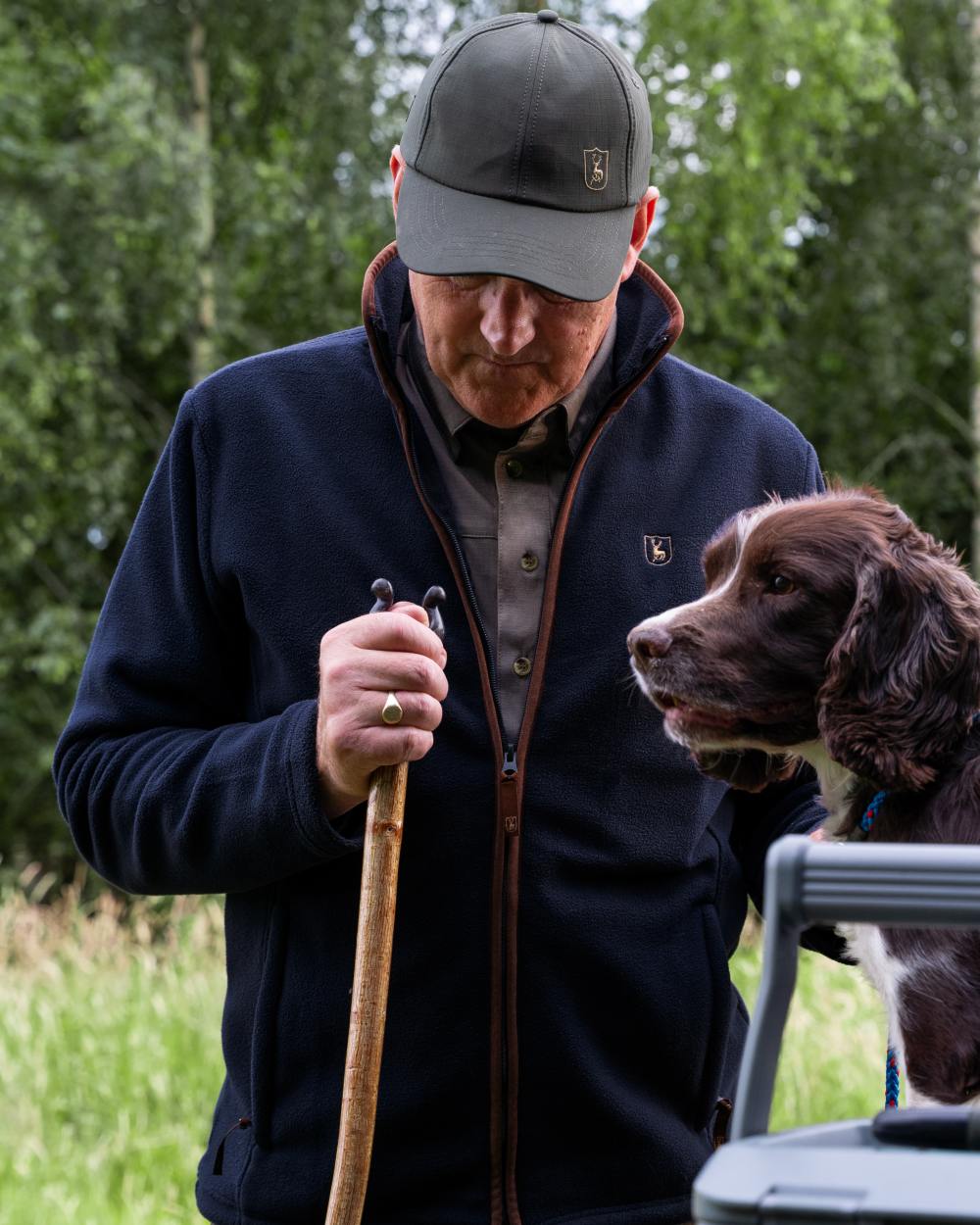 Dark Blue coloured Deerhunter Cumbria Fleece Jacket on forest background