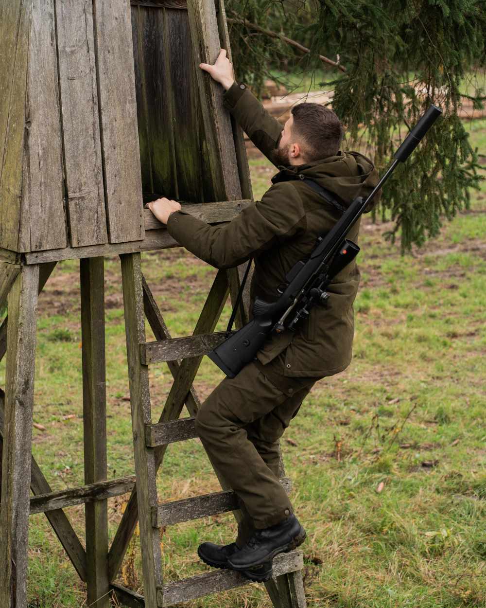 Tarmac Green Coloured Deerhunter Eagle Winter Jacket On A Forest Background