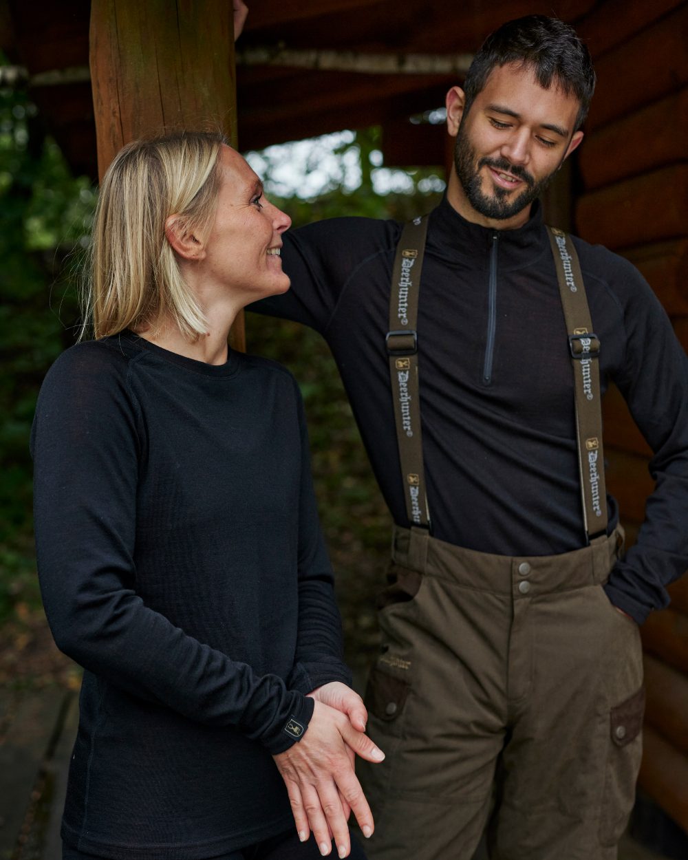 Tarmac Green Coloured Deerhunter Eagle Winter Trousers On A Forest Background