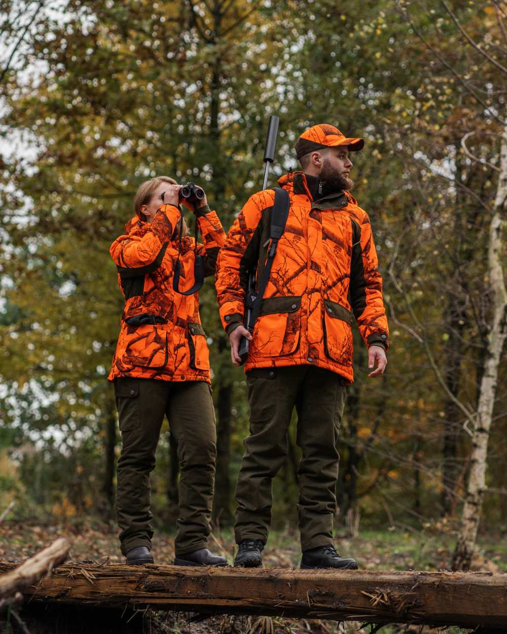 Tarmac Green Coloured Deerhunter Eagle Winter Trousers On A Forest Background