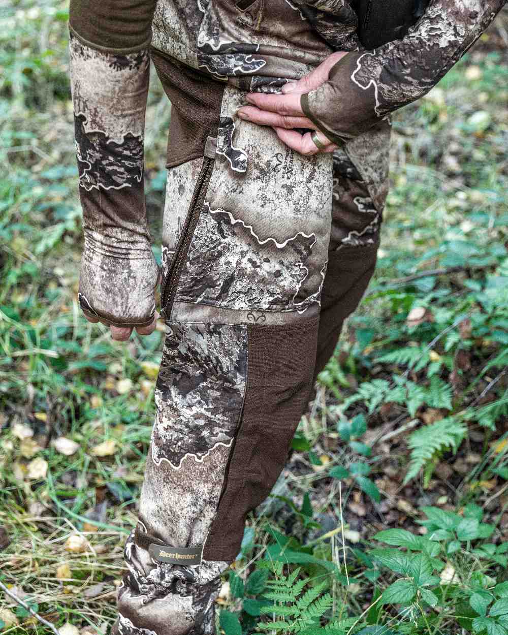 Realtree Excape coloured Deerhunter Excape Light Trousers on forest background