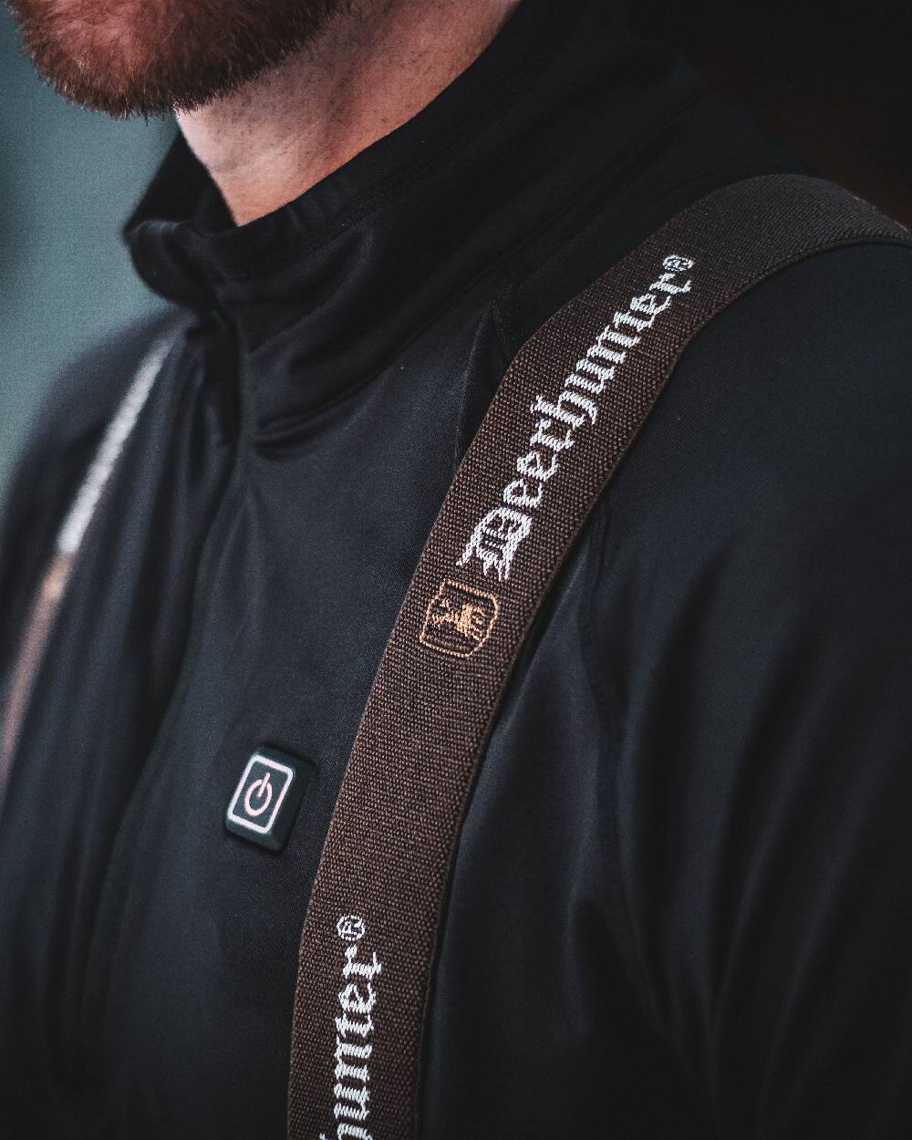 Art Green coloured Deerhunter Excape Winter Waterproof Trousers on blurry background