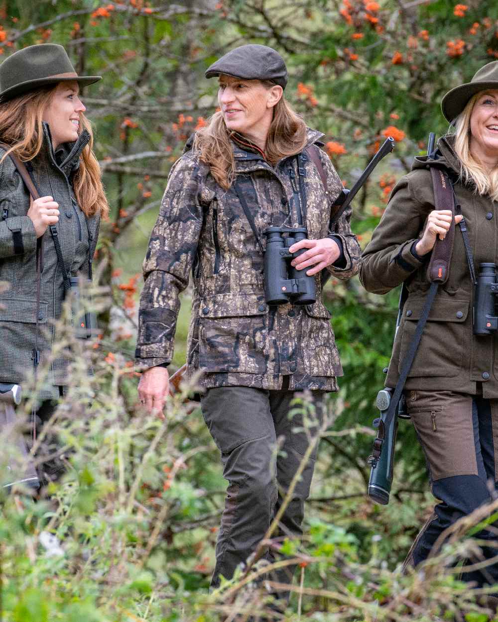 Elmwood coloured Deerhunter Flat Cap on forest background