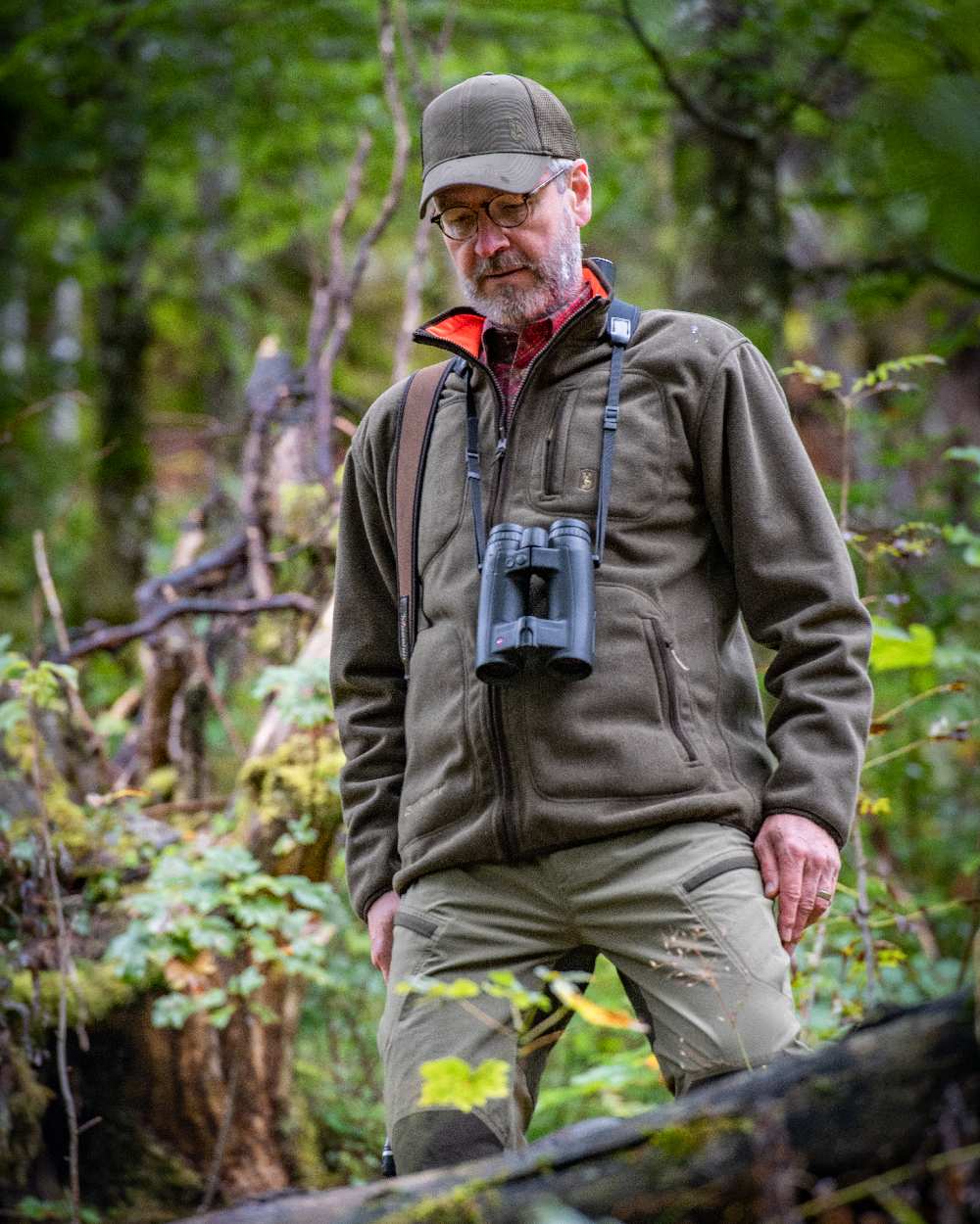 Canteen Orange coloured Deerhunter Gamekeeper Reversible Bonded Fleece Jacket on forest background