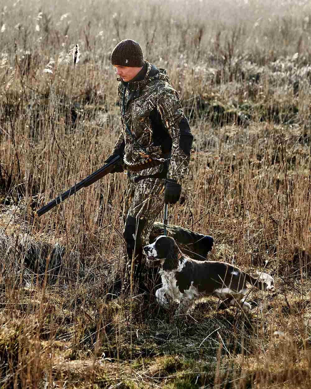 Realtree Max-7 coloured Deerhunter Heat Game Trousers on grassy background