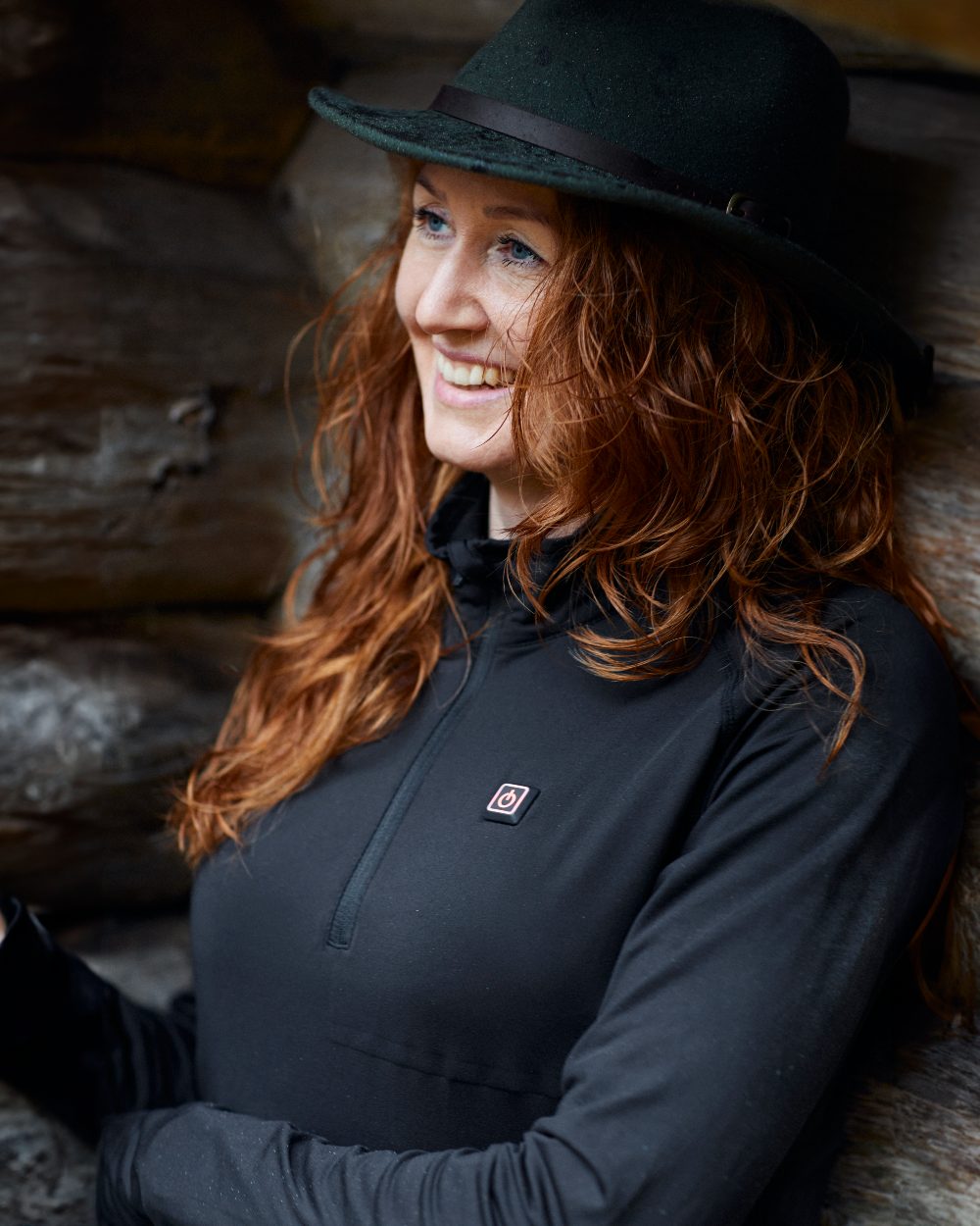 Black coloured Deerhunter Heat Undershirt with Zip Neck on woody background