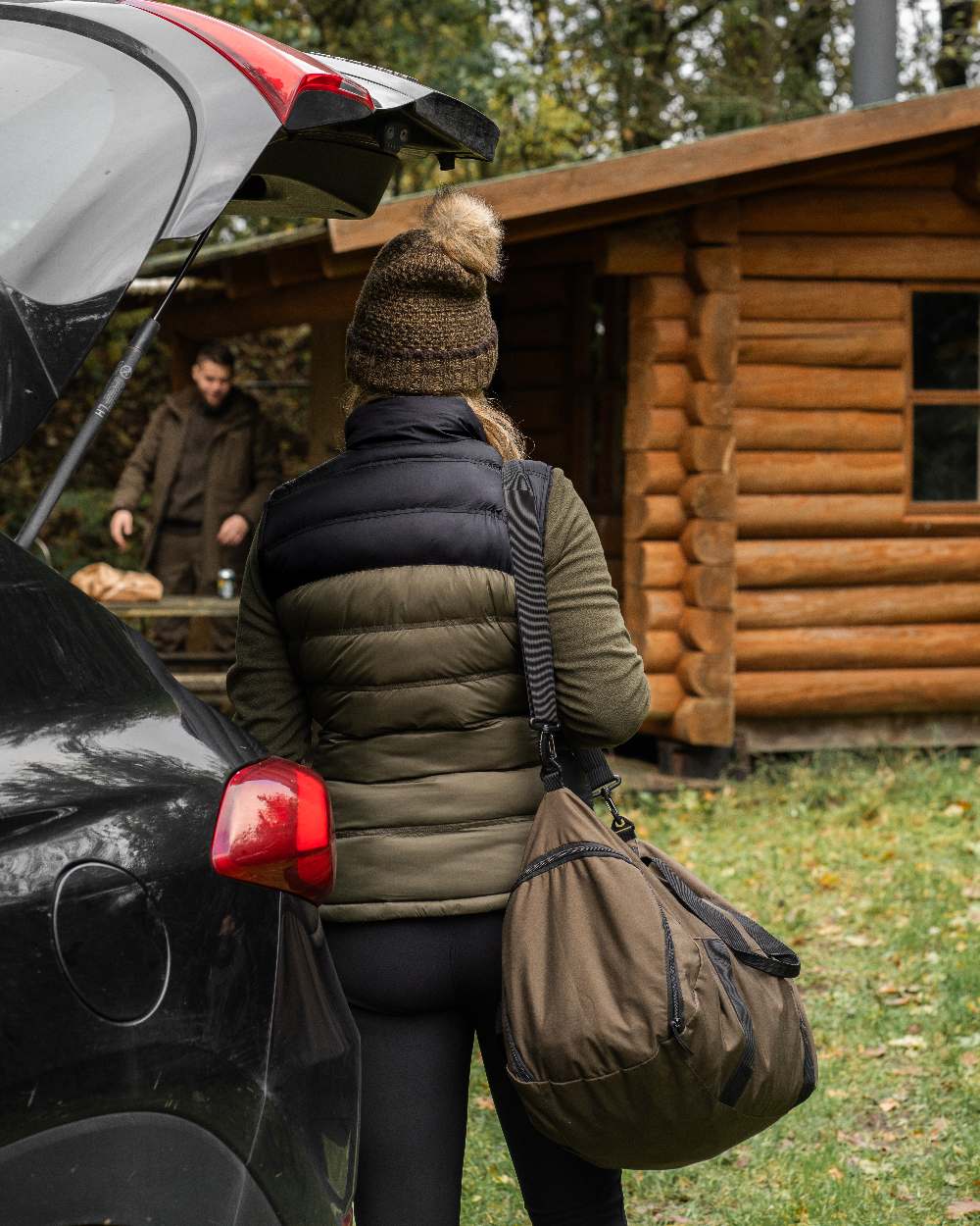 Art Green coloured Deerhunter Ladies Knitted Hat on wooden house background