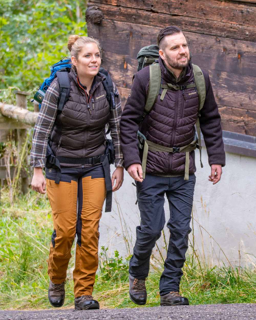 Bronze coloured Deerhunter Lady Ann Trousers on grassy background
