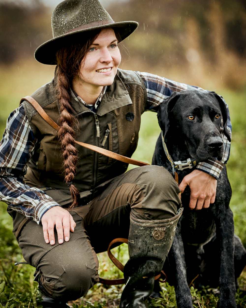 Deep Green coloured Deerhunter Lady Ann Trousers on grass background