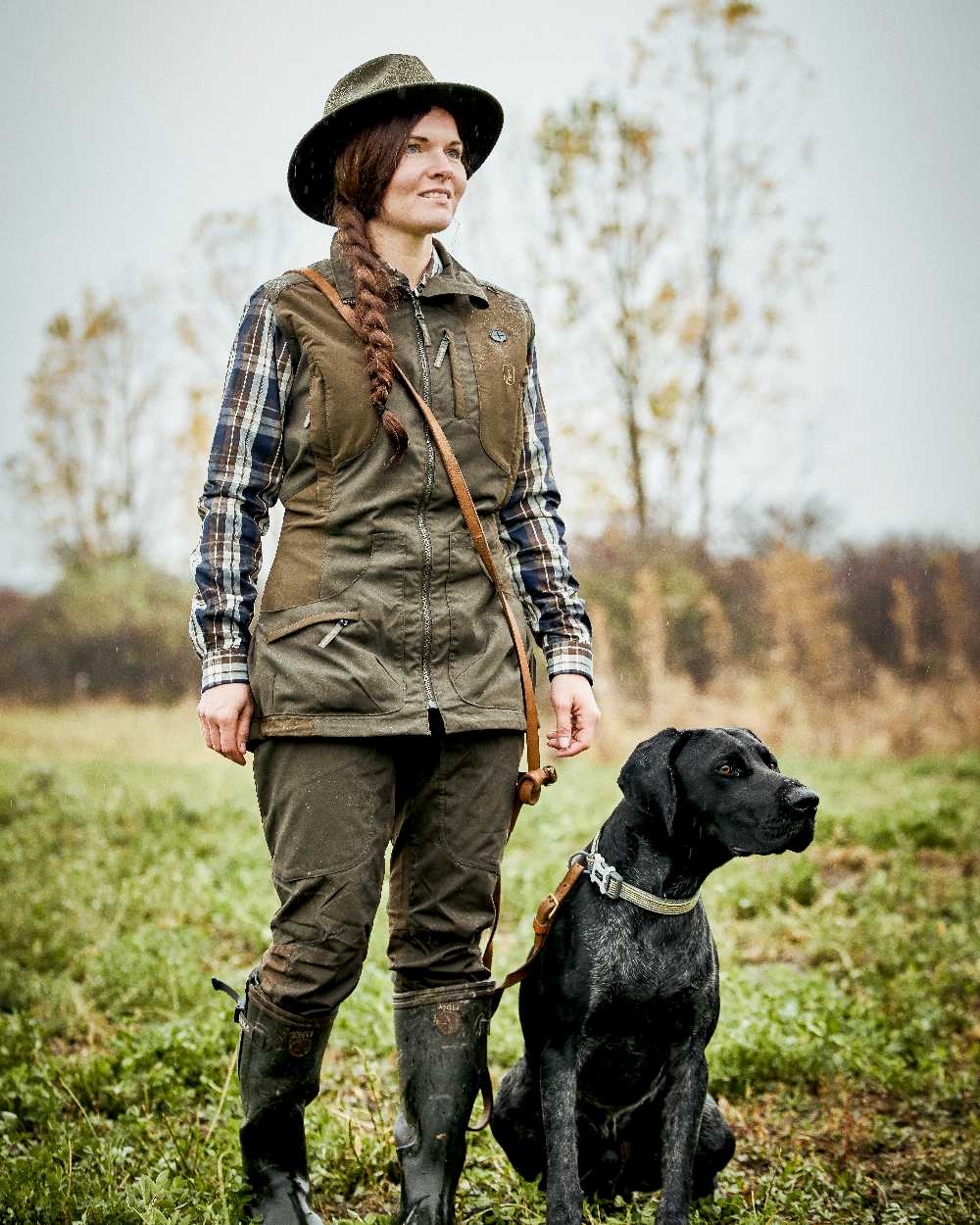 Deep Green coloured Deerhunter Lady Ann Trousers on grass background