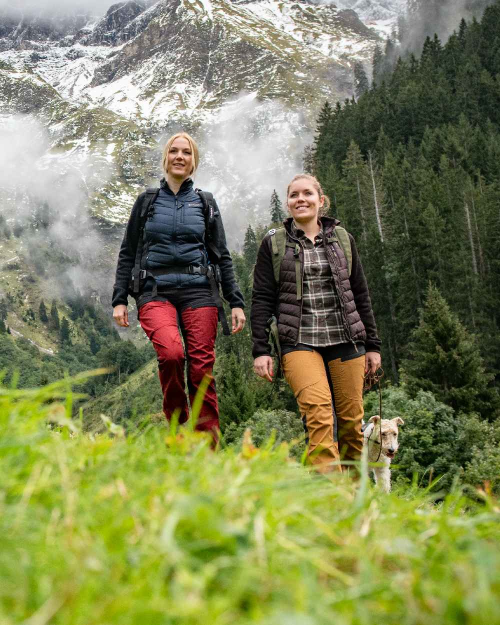 Oxblood Red coloured Deerhunter Lady Ann Trousers on forest background