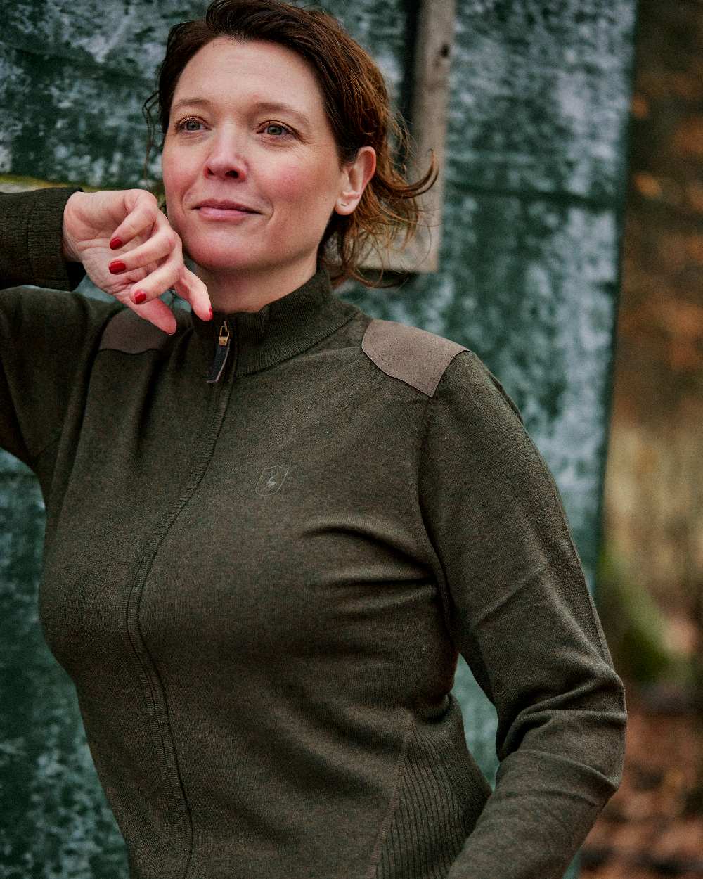 Green Melange coloured Deerhunter Lady Darlington Full Zip Cardigan on blurry background
