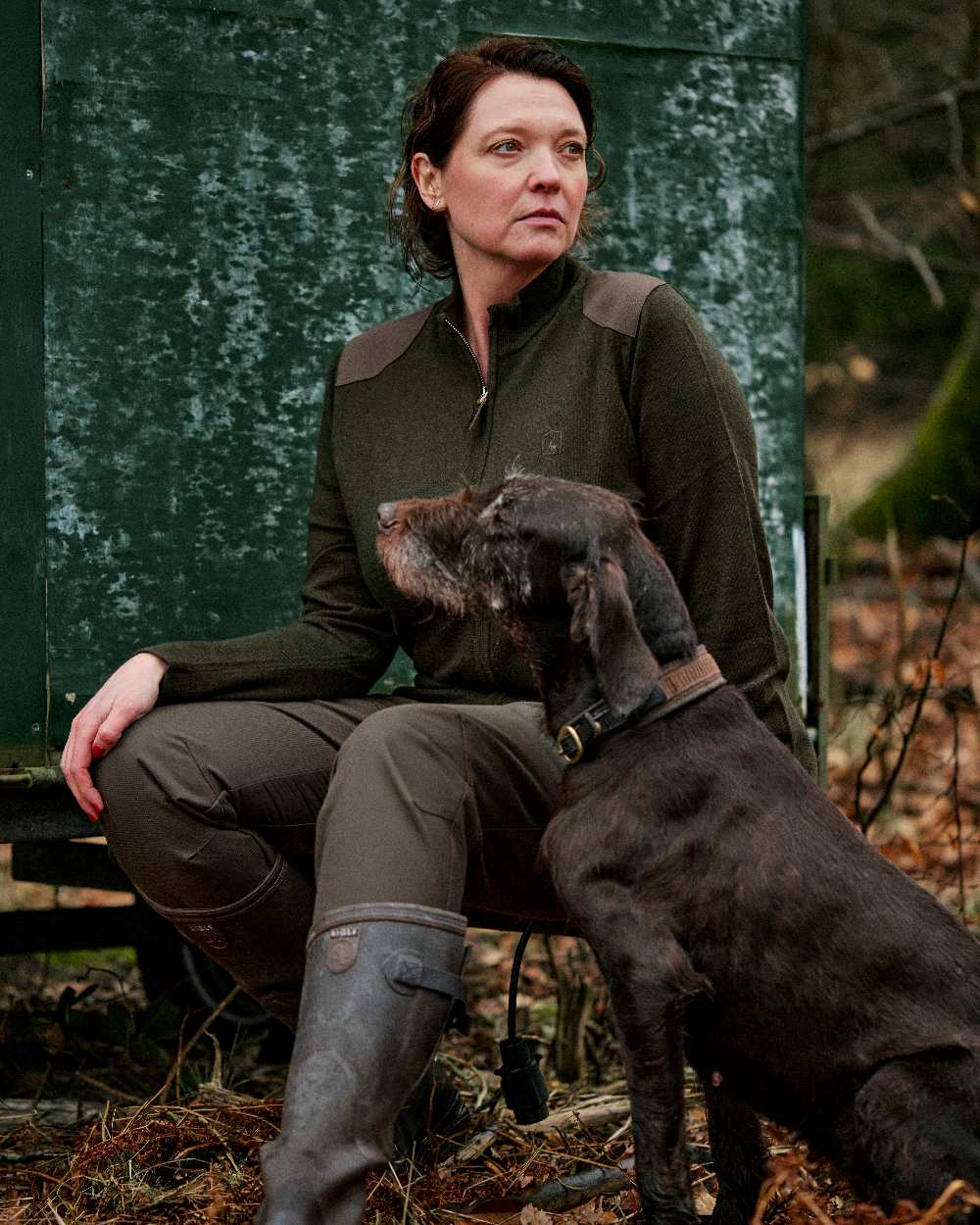 Green Melange coloured Deerhunter Lady Darlington Full Zip Cardigan on forest background
